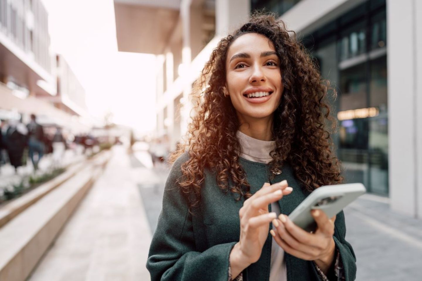 Young woman using mobile phone on T-Mobile Czech / Slovak Telekom network