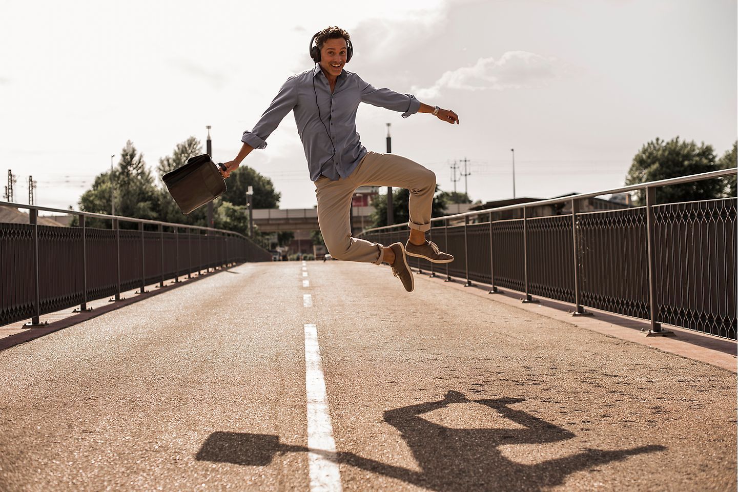 Businessman jumping for joy