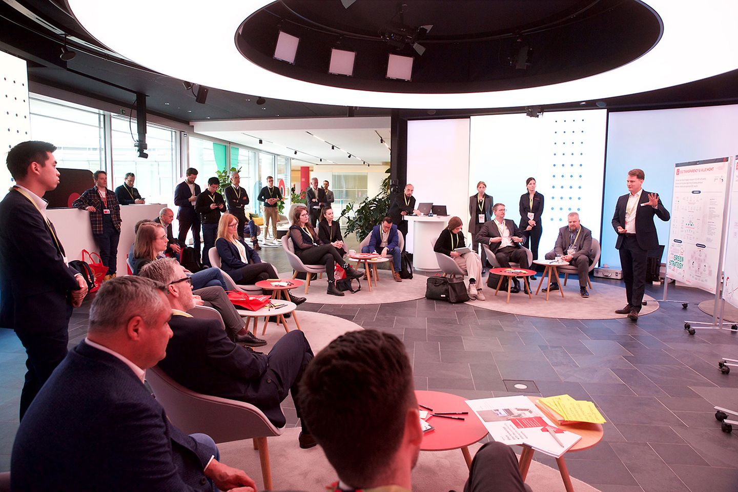 Co-Creation Workshop: a T-Systems event with many participants in a discussion panel