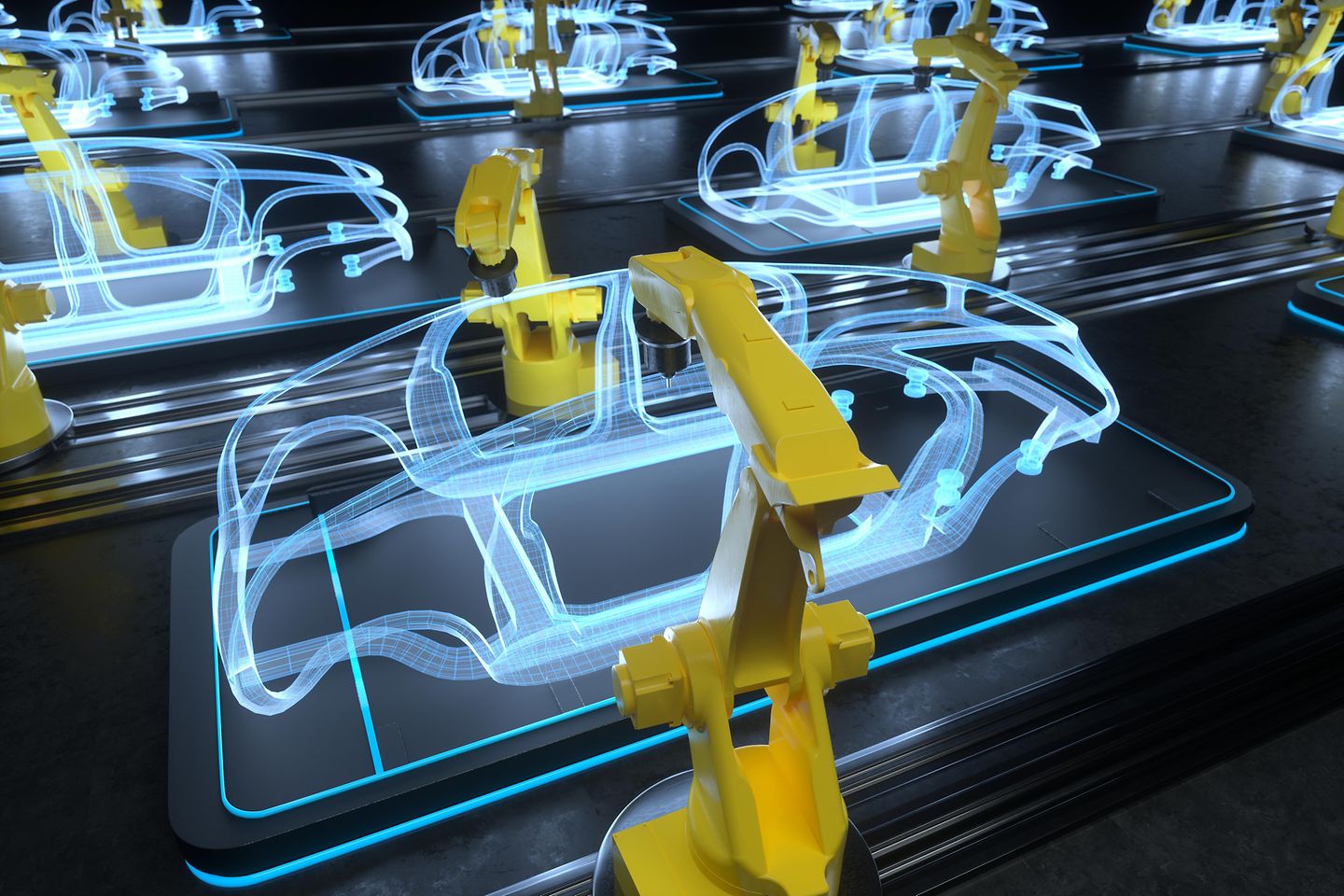 Brazos robóticos trabajando en una cadena de producción de automóviles