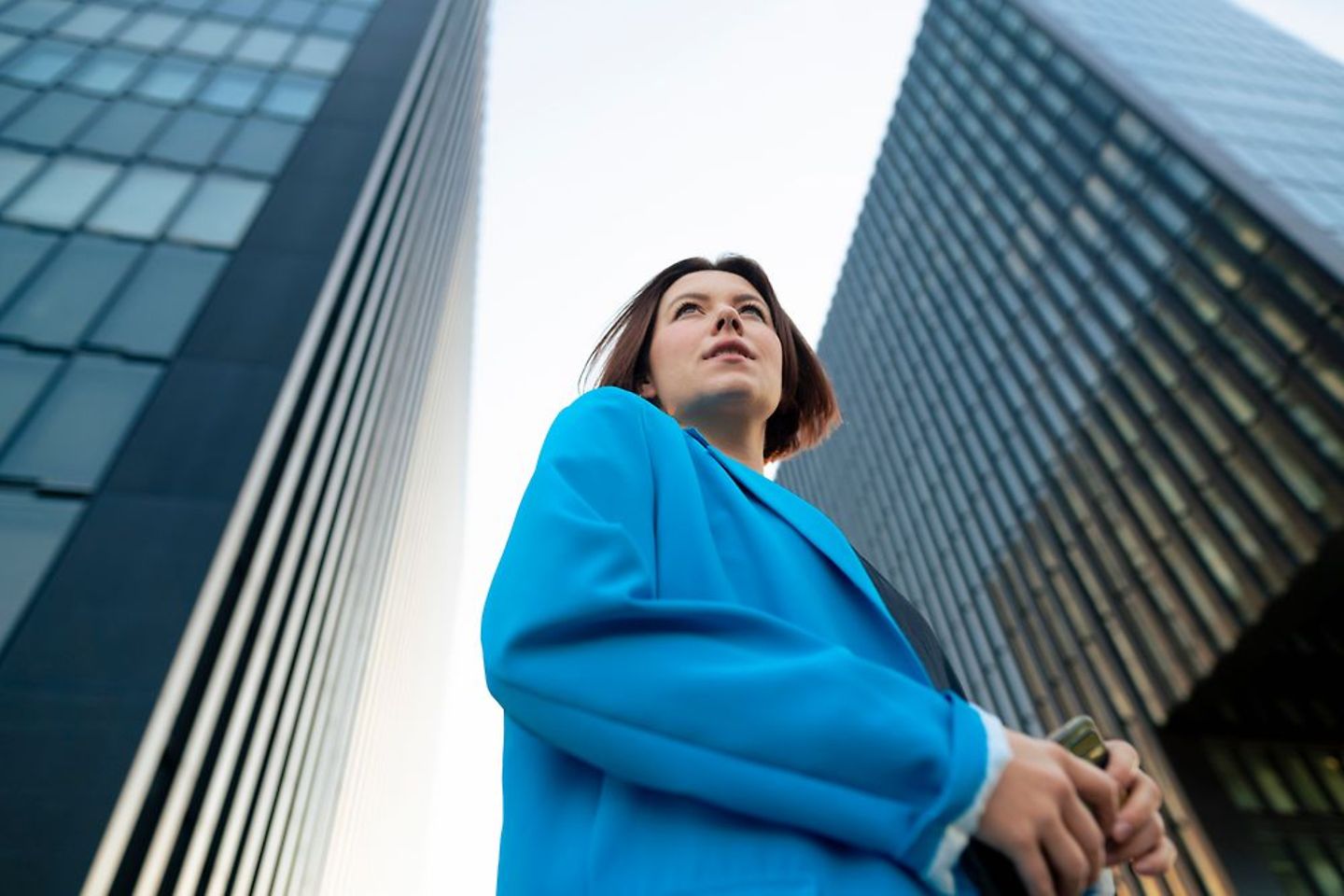 Female civil servant in front of administrative government building