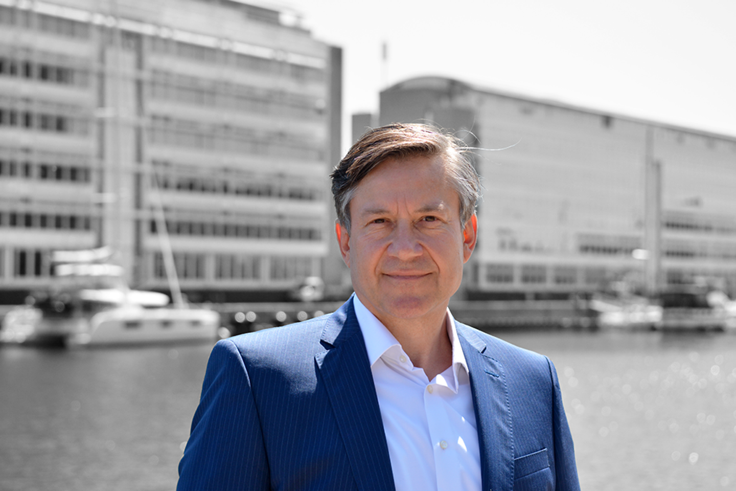 Image shows Managing Director Klaus Koefoed in front of Danish harbour