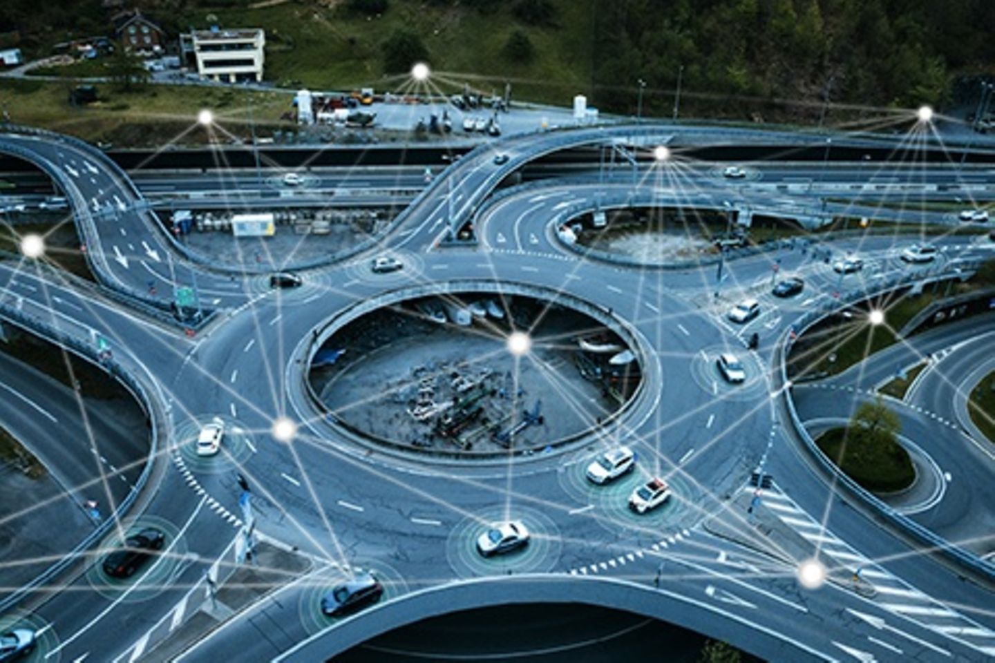 Cars driving in traffic circles receive over-the-air updates