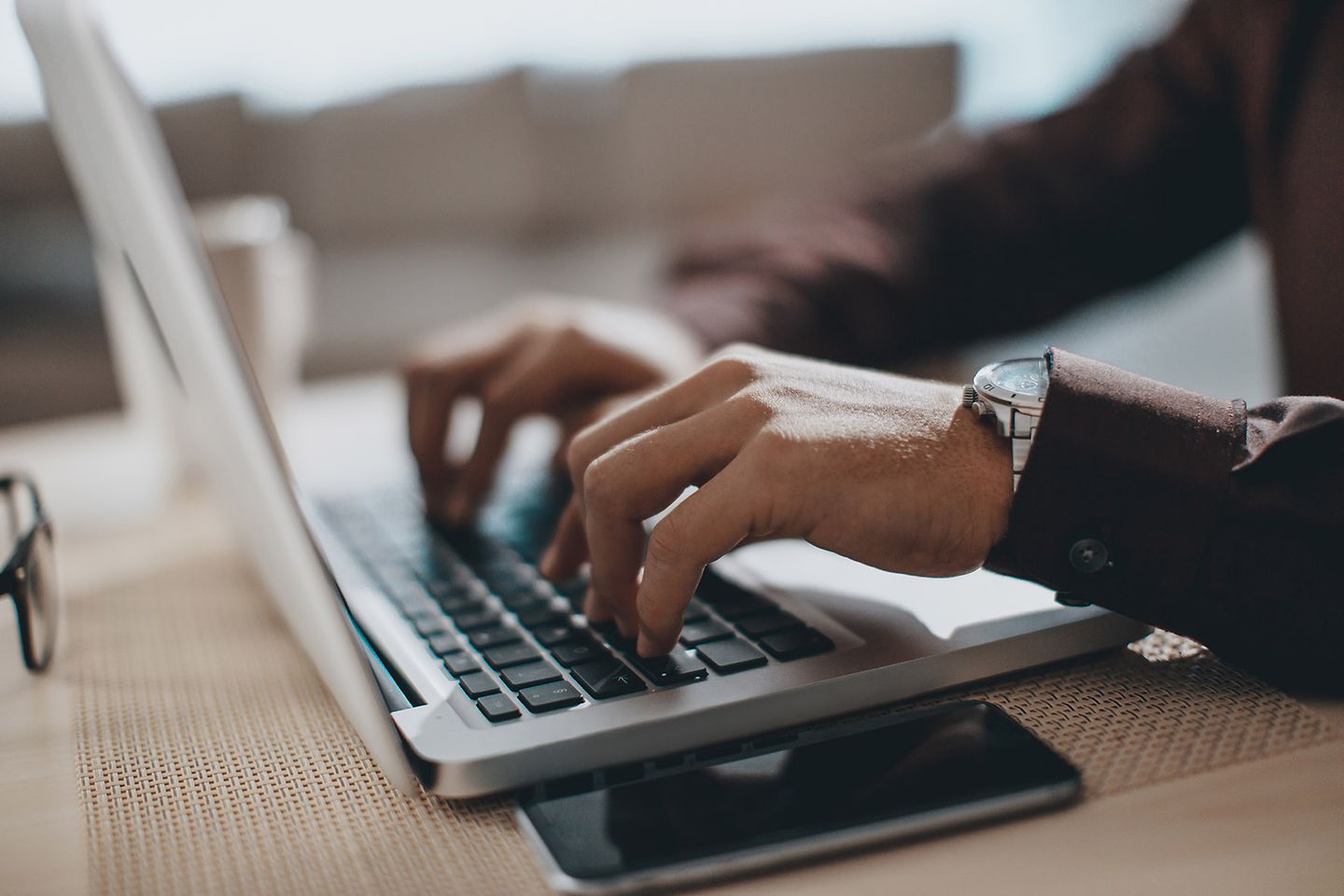 Dual student sits in front of the keyboard and enters data