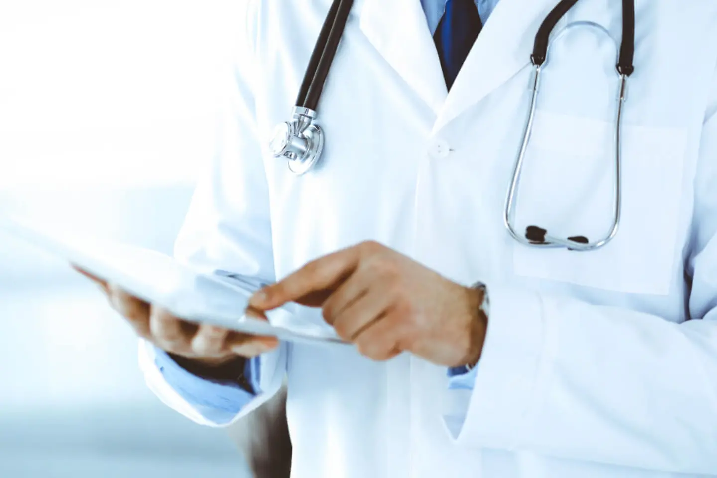 Doctor with tablet