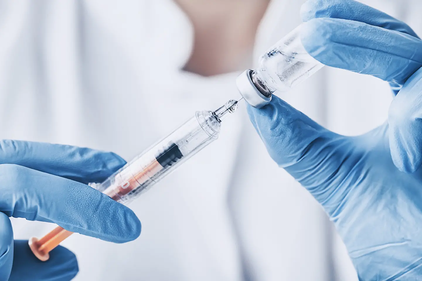 Doctor with injection vaccine vaccination medicine