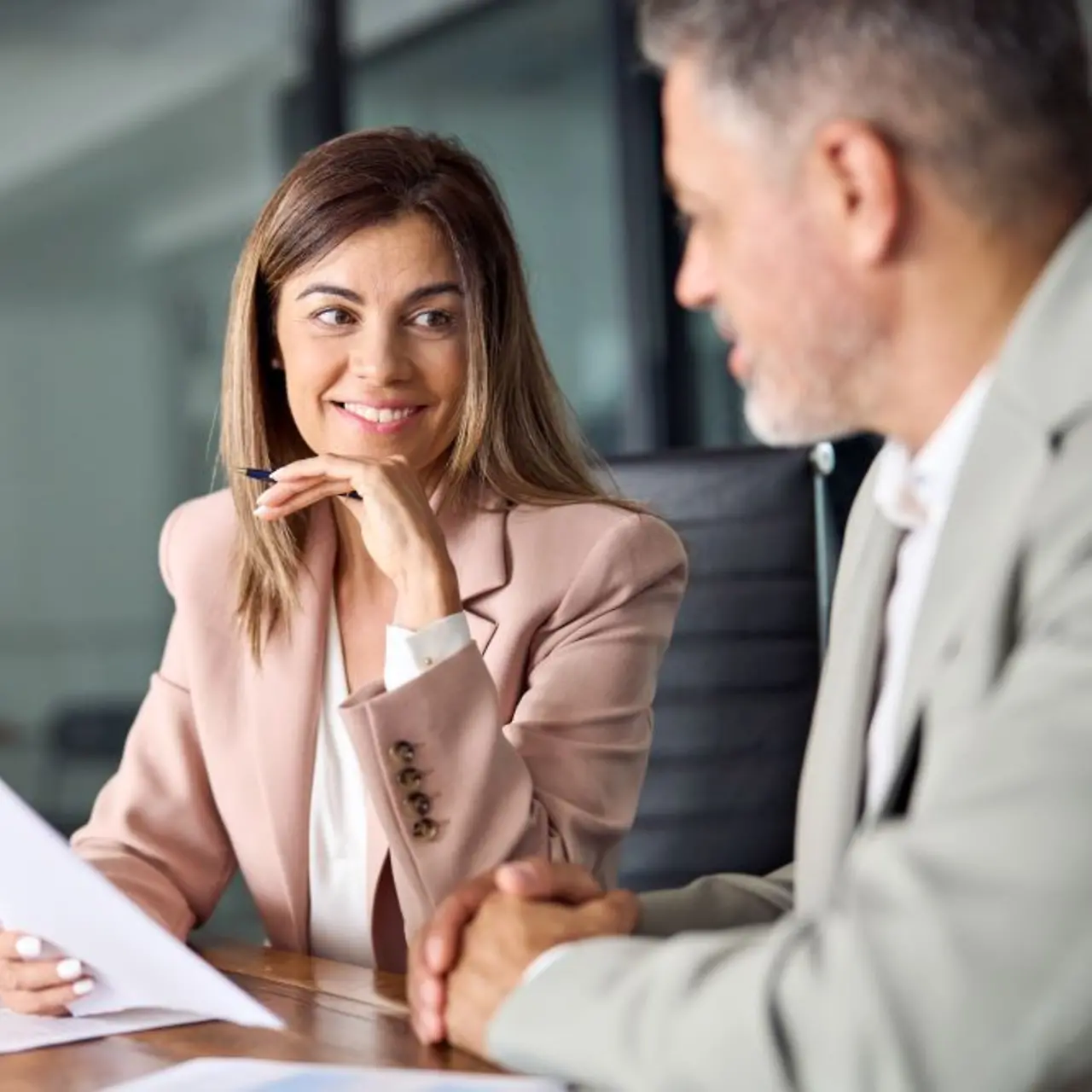 Businesswoman and business man in a consulting situation