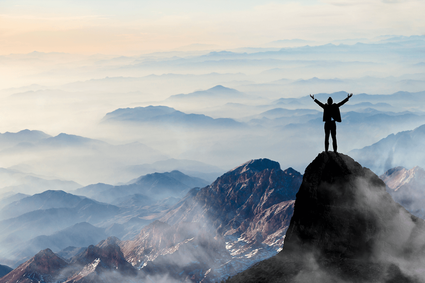 A person on the top of a hill